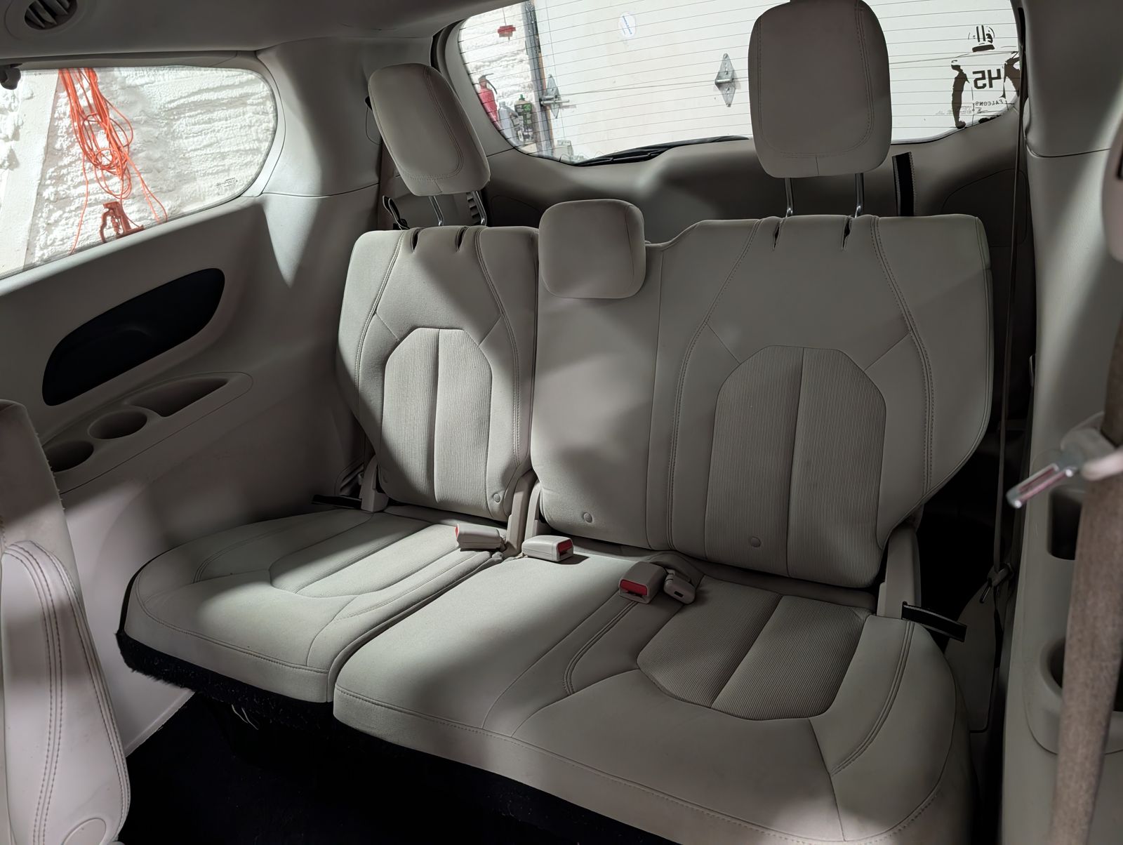 Minivan second and third row seats cleaned and protected during interior detailing in Newark, Ohio