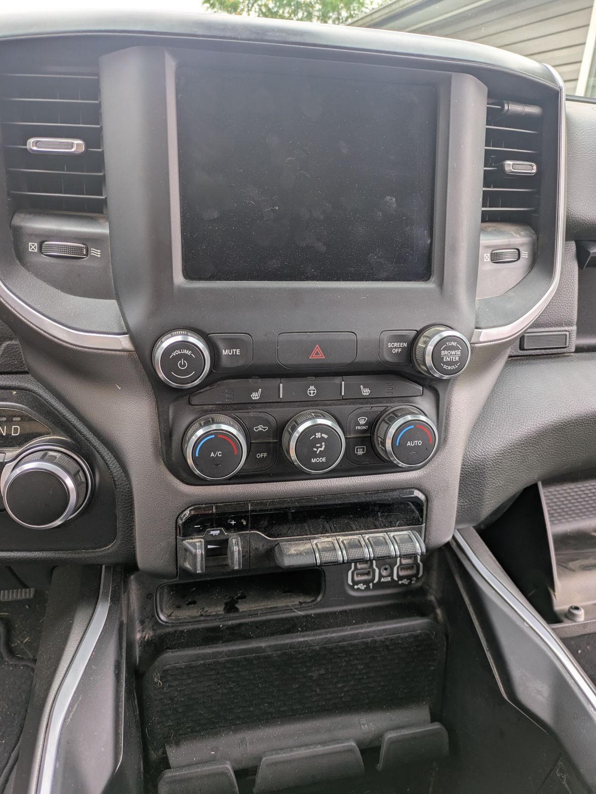 Ram truck dashboard, screen and center console cleaned and dressed during interior detailing in Newark, Ohio