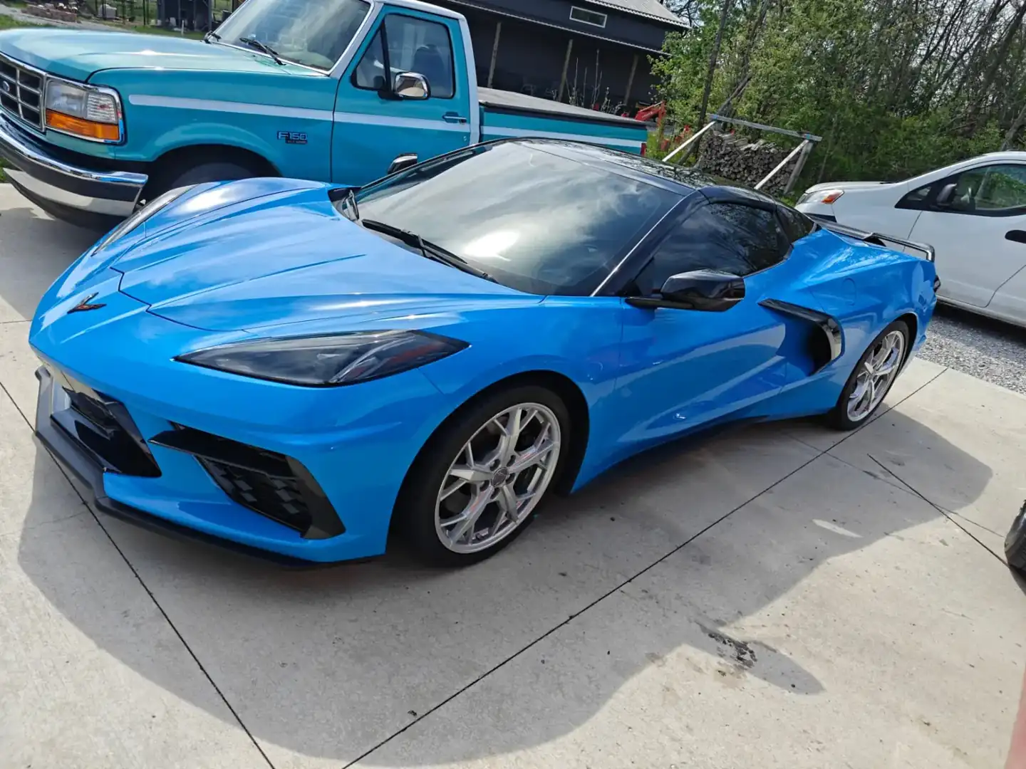 Freshly detailed blue Chevrolet Corvette with a high-gloss corrected finish outside Newark, Ohio
